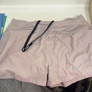 Nike Women's Soft Pink Athletic Shorts